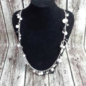 Silver necklace with black, white and silver beads